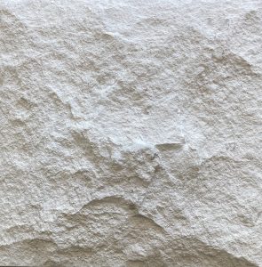 Olinda Imperial Hand Split Face limestone cladding. A white coloured textured stone cladding.