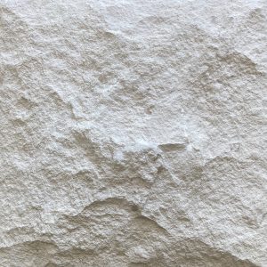 Olinda Imperial Hand Split Face limestone cladding. A white coloured textured stone cladding.