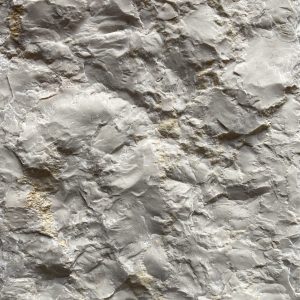 E31 Luxembourg Beige Split Face - a beige rocky textured limestone cladding