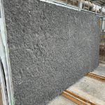 BRUGES NERO Rock Crust Slab 40mm - black limestone slab with rough texture