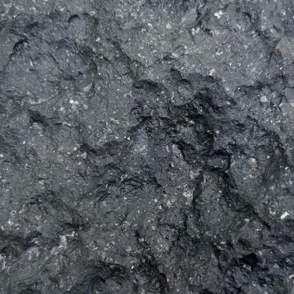 Bruges Rock Crust Extra Black is a black limestone with a rough finish for wall cladding.