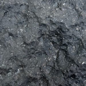 Bruges Rock Crust Extra Black is a black limestone with a rough finish for wall cladding.