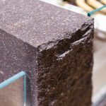 E27 Bruno PF Split Face stone - dark brown rough texture cladding with countertop